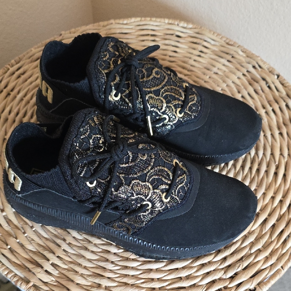 Puma Black Sneakers with Gold Accents